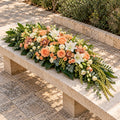 Hommage, grande gerbe en cascade, format Généreux (L. 120 cm) : roses pêche, roses crème, lys blancs, orchidées